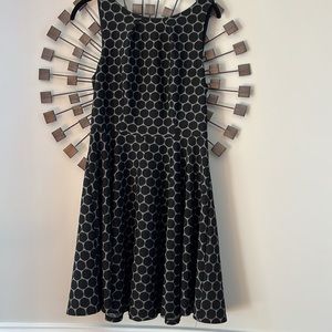 Elle black and grey polka dotted midi dress.